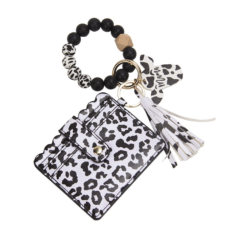 Venta al por mayor MAMA Cow Pattern Card Bag Silicona Beaded Wrist Key Chain